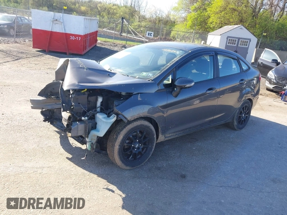 2015 Ford Fiesta SE with VIN 3FADP4BJ1FM128656, listed as a IAAI auction lot 41987997 with 106,588 mi miles. Bid and sale history available at carsss.com. Image 2.