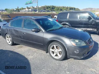 2005 Nissan Altima SE-R z VIN 1N4BL11D85C221686, wystawiony jako IAAI lot #42417098 z przebiegiem 180 905 mil mil oraz . Historia ofert i sprzedaży dostępna na DreamBid. Obrazek 1.