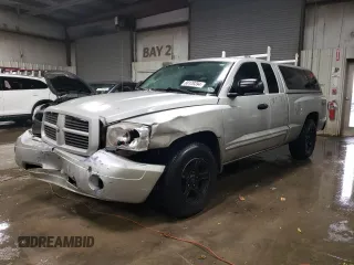 2006 Dodge Dakota SLT with VIN 1D7HW42NX6S711998, listed as a Copart auction lot 80129394 with 214,546 mi miles and Salvage Title. Bid and sale history available at carsss.com. Image 1.