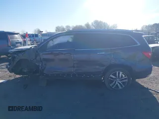 2017 Honda Pilot Touring with VIN 5FNYF5H97HB023919, listed as a IAAI auction lot 41864959 with 70,360 mi miles. Bid and sale history available at carsss.com. Image 14.