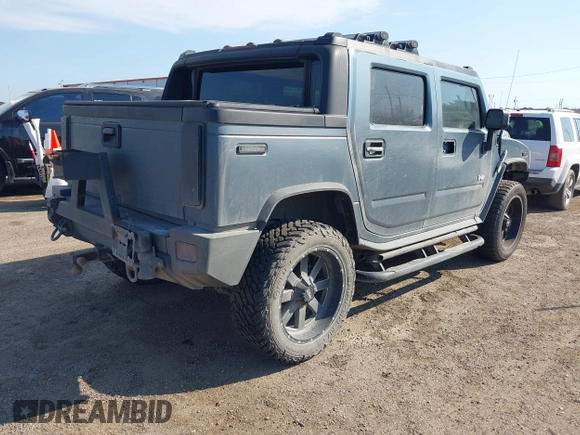2006 Hummer H2 with VIN 5GRGN22U06H103326, listed as a IAAI auction lot 41474829 with 217,436 mi miles. Bid and sale history available at carsss.com. Image 4.