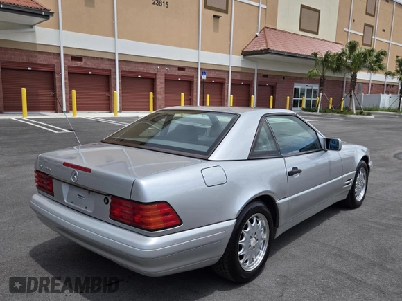1996 Mercedes-Benz SL 320 with VIN WDBFA63F4TF138117, listed as a Copart auction lot 63440965 with 56,621 mi miles and Clean title. Bid and sale history available at DreamBid. Image 4.