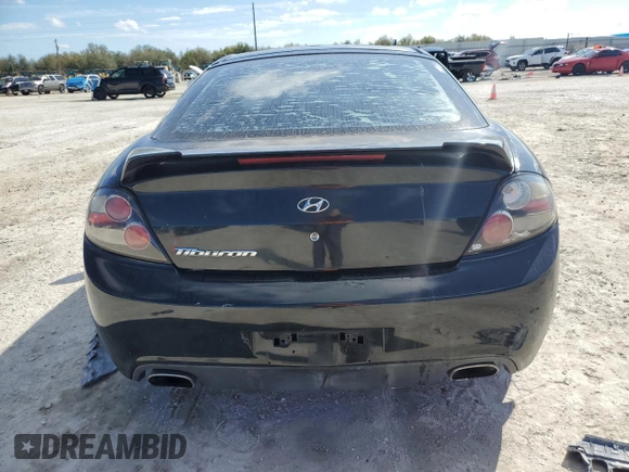 2008 Hyundai Tiburon GS z VIN KMHHM66D08U291605, wystawiony jako Copart lot #46589265 z przebiegiem 177 104 mil mil oraz Szkoda całkowita • Salvage title. Historia ofert i sprzedaży dostępna na DreamBid. Obrazek 6.