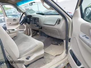 2000 Ford F-150 XL with VIN 1FTRX18L9YNB70363, listed as a IAAI auction lot 42140312 with 226,686 mi miles and . Bid and sale history available at DreamBid. Image 5.