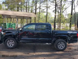 2019 Toyota Tacoma 4WD SR with VIN 3TMCZ5AN5KM221720, listed as a IAAI auction lot 41967986 with 83,701 mi miles. Bid and sale history available at carsss.com. Image 19.