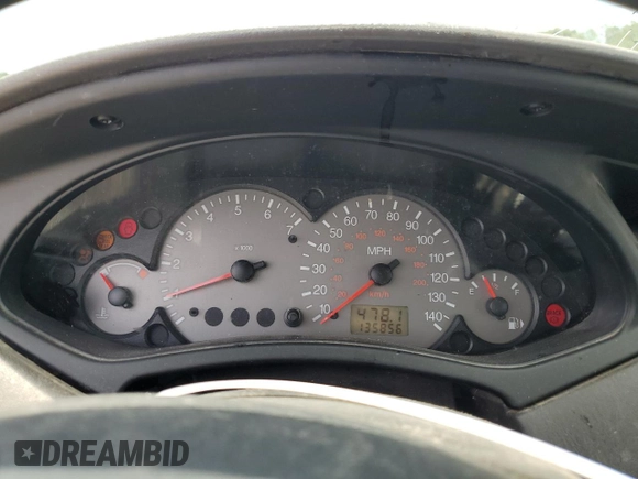 2003 Ford Focus ZX3 with VIN 3FAFP31383R117755, listed as a Copart auction lot 60668725 with 135,856 mi miles and Salvage title. Bid and sale history available at DreamBid. Image 9.