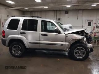 2004 Jeep Liberty Sport with VIN 1J4GL48K44W182897, listed as a IAAI auction lot 40768956 with 241,550 mi miles and . Bid and sale history available at DreamBid. Image 14.