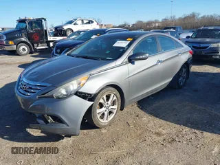 2013 Hyundai Sonata Limited with VIN 5NPEC4ACXDH775136, listed as a IAAI auction lot 41715781 with 214,693 mi miles and . Bid and sale history available at carsss.com. Image 2.