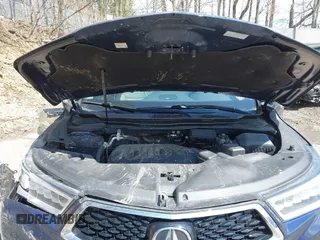 2018 Acura MDX Technology with VIN 5J8YD4H57JL005535, listed as a IAAI auction lot 42027222 with 91,082 mi miles and . Bid and sale history available at DreamBid. Image 10.