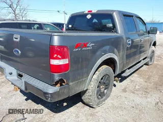 2004 Ford F-150 XLT with VIN 1FTPW14504KA75025, listed as a IAAI auction lot 41794581 with 213,022 mi miles. Bid and sale history available at carsss.com. Image 4.