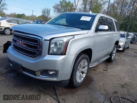 2015 GMC Yukon SLE with VIN 1GKS1AKC8FR540627, listed as a IAAI auction lot 42004023 with 128,195 mi miles. Bid and sale history available at carsss.com. Image 17.