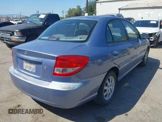 2005 Kia Rio with VIN KNADC125356385613, listed as a IAAI auction lot 41841381 with 91,273 mi miles. Bid and sale history available at carsss.com. Image 4.