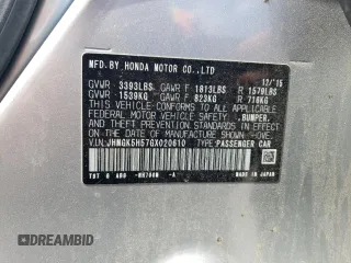 2016 Honda Fit LX z VIN JHMGK5H57GX020610, wystawiony jako Copart lot #61012305 z przebiegiem 99 001 mil mil oraz Szkoda całkowita • Salvage title. Historia ofert i sprzedaży dostępna na DreamBid. Obrazek 13.