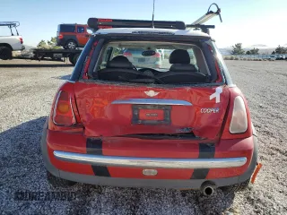 2004 MINI Hardtop with VIN WMWRC33434TC53820, listed as a Copart auction lot 85389994 with 164,452 mi miles and Salvage Title. Bid and sale history available at DreamBid. Image 6.