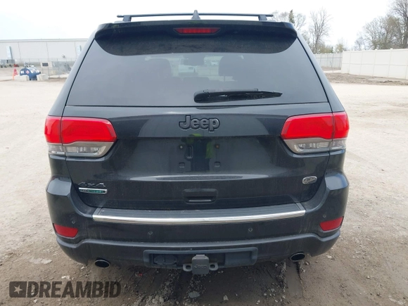 2014 Jeep Grand Cherokee Overland with VIN 1C4RJFCM8EC486259, listed as a IAAI auction lot 42105296 with 129,342 mi miles. Bid and sale history available at carsss.com. Image 16.