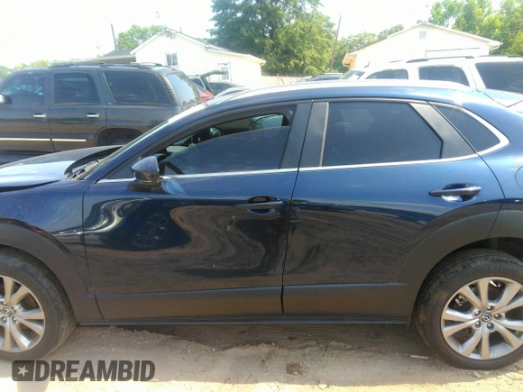 2022 Mazda CX-30 S Carbon Edition with VIN 3MVDMBCL6NM423255, listed as a IAAI auction lot 42209829 with 51,589 mi miles and . Bid and sale history available at DreamBid. Image 14.