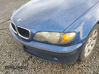 2004 BMW 3 Series 325i with VIN WBAET37414NH06040, listed as a IAAI auction lot 41793260 with 212,541 mi miles. Bid and sale history available at carsss.com. Image 6.