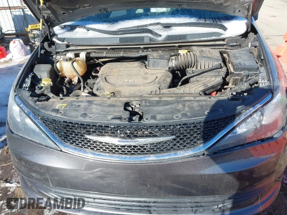 2017 Chrysler Pacifica Touring with VIN 2C4RC1DG7HR648786, listed as a IAAI auction lot 41570029 with 125,406 mi miles and . Bid and sale history available at DreamBid. Image 10.