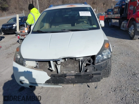 2007 Nissan Quest S with VIN 5N1BV28U77N127494, listed as a IAAI auction lot 41445049 with 210,641 mi miles. Bid and sale history available at carsss.com. Image 12.