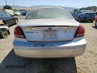 2004 Ford Taurus SE with VIN 1FAFP53U34A132063, listed as a Copart auction lot 58622055 with 96,858 mi miles and Clean title. Bid and sale history available at DreamBid. Image 6.