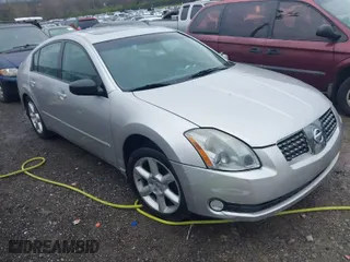 2004 Nissan Maxima SL with VIN 1N4BA41E14C802963, listed as a IAAI auction lot 41852156 with 112,855 mi miles. Bid and sale history available at carsss.com. Image 1.