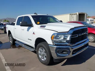 2021 Ram 2500 Big Horn with VIN 3C6UR5DL1MG676863, listed as a IAAI auction lot 42386260 with 105,328 mi miles and . Bid and sale history available at DreamBid. Image 1.