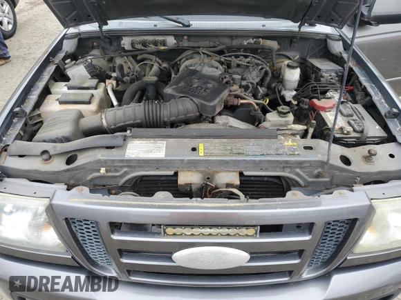 2007 Ford Ranger XL z VIN 1FTZR15E77PA46062, wystawiony jako Copart lot #58016395 z przebiegiem 106 402 mil mil oraz Czysty tytuł • Clean title. Historia ofert i sprzedaży dostępna na DreamBid. Obrazek 11.