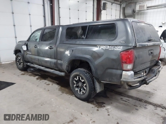 2016 Toyota Tacoma SR5 with VIN 3TMDZ5BNXGM009423, listed as a IAAI auction lot 41008068 with 107,426 mi miles and . Bid and sale history available at DreamBid. Image 3.