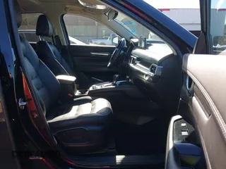2021 Mazda CX-5 Grand Touring with VIN JM3KFADM1M0406098, listed as a IAAI auction lot 41654735 with 33,050 mi miles. Bid and sale history available at carsss.com. Image 5.