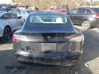 2019 Tesla Model 3 Mid Range z VIN 5YJ3E1EA4KF317872, wystawiony jako IAAI lot #41491269 z przebiegiem 90 772 mil mil oraz . Historia ofert i sprzedaży dostępna na DreamBid. Obrazek 15.