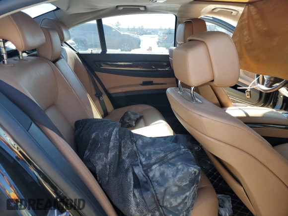 2012 BMW 7 Series 740i with VIN WBAKA4C52CDS99036, listed as a Copart auction lot 88492615 with Not provided miles and Salvage title. Bid and sale history available at DreamBid. Image 10.