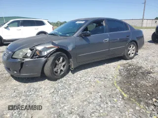 2005 Nissan Altima SE z VIN 1N4BL11D85C209229, wystawiony jako Copart lot #52391285 z przebiegiem 164 231 mil mil oraz Szkoda całkowita • Salvage title. Historia ofert i sprzedaży dostępna na DreamBid. Obrazek 1.