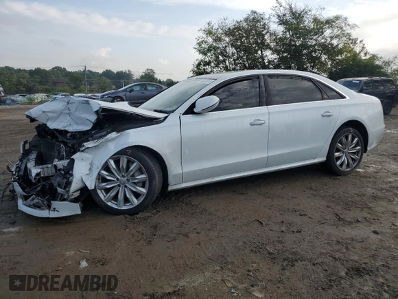 2017 Audi A8 L with VIN WAU44AFDXHN006499, listed as a Copart auction lot 74043014 with 73,043 mi miles and Salvage Title. Bid and sale history available at carsss.com. Image 1.