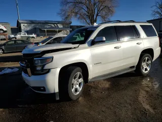 2015 Chevrolet Tahoe LT z VIN 1GNSCBKC2FR738042, wystawiony jako Copart lot #84856214 z przebiegiem 144 325 mil mil oraz Szkoda całkowita • Salvage title. Historia ofert i sprzedaży dostępna na DreamBid. Obrazek 1.