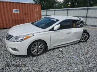 2013 Hyundai Azera with VIN KMHFG4JG6DA221364, listed as a Copart auction lot 52316895 with 141,559 mi miles and Salvage Title. Bid and sale history available at carsss.com. Image 1.