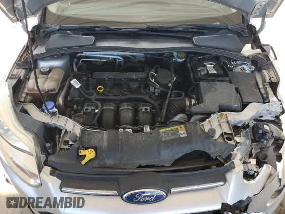 2012 Ford Focus SE with VIN 1FAHP3F29CL161559, listed as a Copart auction lot 61695575 with 127,412 mi miles and Salvage title. Bid and sale history available at DreamBid. Image 11.