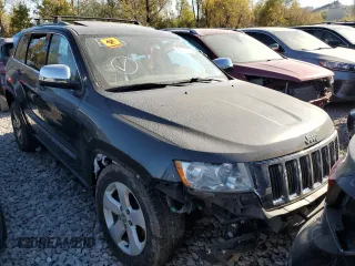2011 Jeep Grand Cherokee 70th Anniversary with VIN 1J4RR4GT0BC632321, listed as a Copart auction lot 66772334 with 203,708 mi miles and Salvage Title. Bid and sale history available at carsss.com. Image 4.