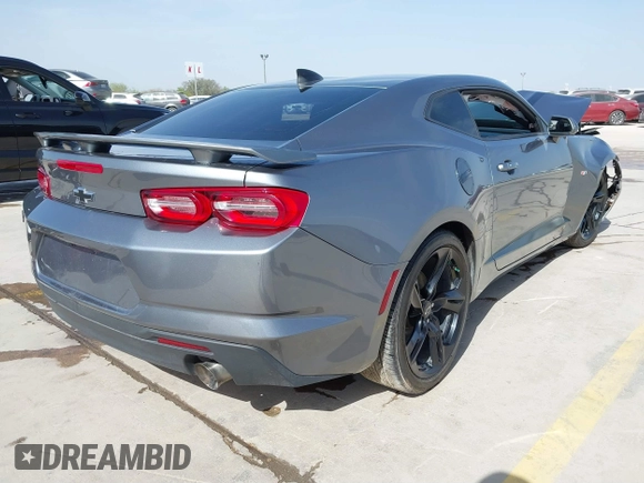 2021 Chevrolet Camaro 1LT z VIN 1G1FB1RX9M0125698, wystawiony jako IAAI lot #41824653 z przebiegiem 69 365 mil mil oraz . Historia ofert i sprzedaży dostępna na DreamBid. Obrazek 4.