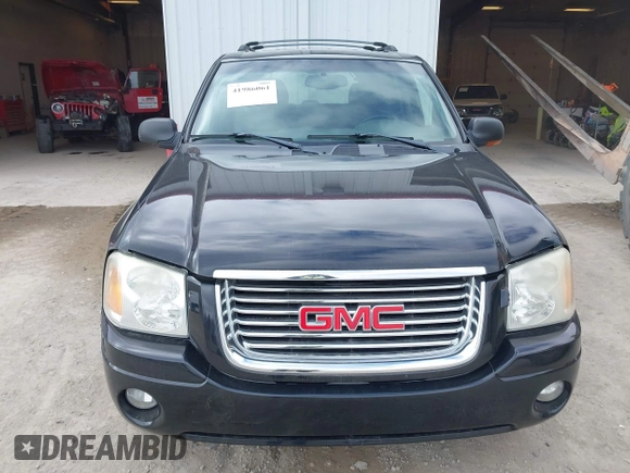 2002 GMC Envoy SLT with VIN 1GKDT13S622506181, listed as a IAAI auction lot 41986061 with 212,583 mi miles. Bid and sale history available at carsss.com. Image 6.