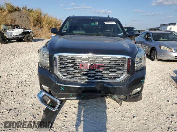 2019 GMC Yukon Denali with VIN 1GKS1CKJ9KR134571, listed as a Copart auction lot 73275664 with 50,853 mi miles and Salvage Title. Bid and sale history available at carsss.com. Image 5.