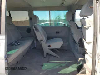 2002 Volkswagen EuroVan с VIN WV2KB47012H065431, выставлен на аукционе Copart как лот 49010445 с пробегом 78 985 миль миль и Чистый • Clean title. История ставок и продаж доступна на DreamBid. Изображение 11.