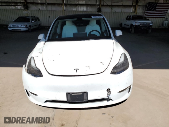 2022 Tesla Model Y Performance z VIN 7SAYGDEF0NF337959, wystawiony jako Copart lot #56871985 z przebiegiem 54 527 mil mil oraz Szkoda całkowita • Salvage title. Historia ofert i sprzedaży dostępna na DreamBid. Obrazek 5.