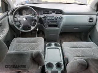 2003 Honda Odyssey EX with VIN 2HKRL18603H008412, listed as a Copart auction lot 87502365 with 352,773 mi miles and Salvage Title. Bid and sale history available at DreamBid. Image 8.