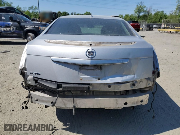 2013 Cadillac XTS Luxury с VIN 2G61P5S3XD9189744, выставлен на аукционе Copart как лот 54391535 с пробегом 132 841 миль миль и Списание • Salvage title. История ставок и продаж доступна на DreamBid. Изображение 6.