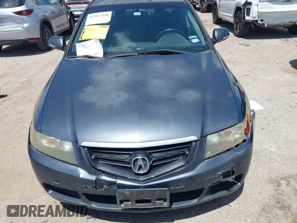 2005 Acura TSX with VIN JH4CL96805C035339, listed as a IAAI auction lot 42587430 with 212,221 mi miles and . Bid and sale history available at DreamBid. Image 13.