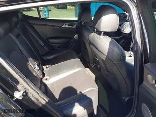 2018 Kia Stinger GT1 with VIN KNAE45LC4J6035780, listed as a IAAI auction lot 41560394 with 86,312 mi miles. Bid and sale history available at carsss.com. Image 8.