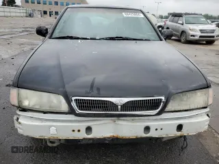 1999 Infiniti G20 z VIN JNKCP11A8XT019442, wystawiony jako Copart lot #66429804 z przebiegiem 209 367 mil mil oraz Szkody całkowita. Historia ofert i sprzedaży dostępna na DreamBid. Obrazek 5.