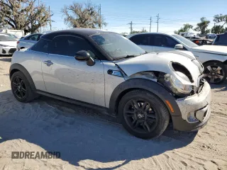 2014 MINI Coupe S z VIN WMWSX3C57ET409158, wystawiony jako Copart lot #81650034 z przebiegiem 118 523 mil mil oraz Szkody całkowita. Historia ofert i sprzedaży dostępna na DreamBid. Obrazek 4.