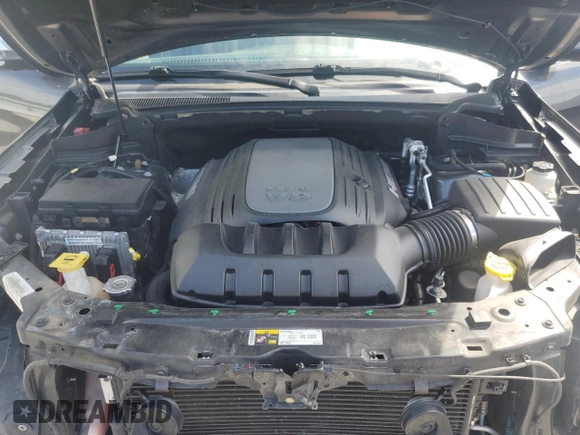 2014 Jeep Grand Cherokee Summit with VIN 1C4RJFJT4EC346946, listed as a Copart auction lot 60613025 with 50,565 mi miles and Salvage title. Bid and sale history available at DreamBid. Image 12.