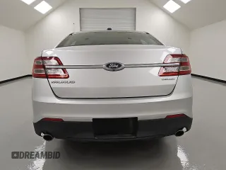 2016 Ford Taurus SE z VIN 1FAHP2D88GG126947, wystawiony jako Copart lot #55256955 z przebiegiem 88 821 mil mil oraz Czysty tytuł • Clean title. Historia ofert i sprzedaży dostępna na DreamBid. Obrazek 6.
